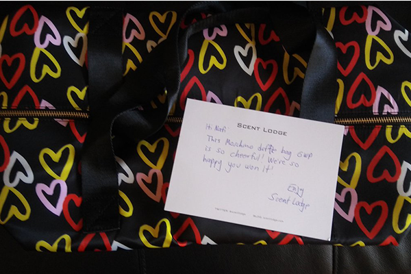 Nafi T won this cute Moschino heart-print duffle bag gwp